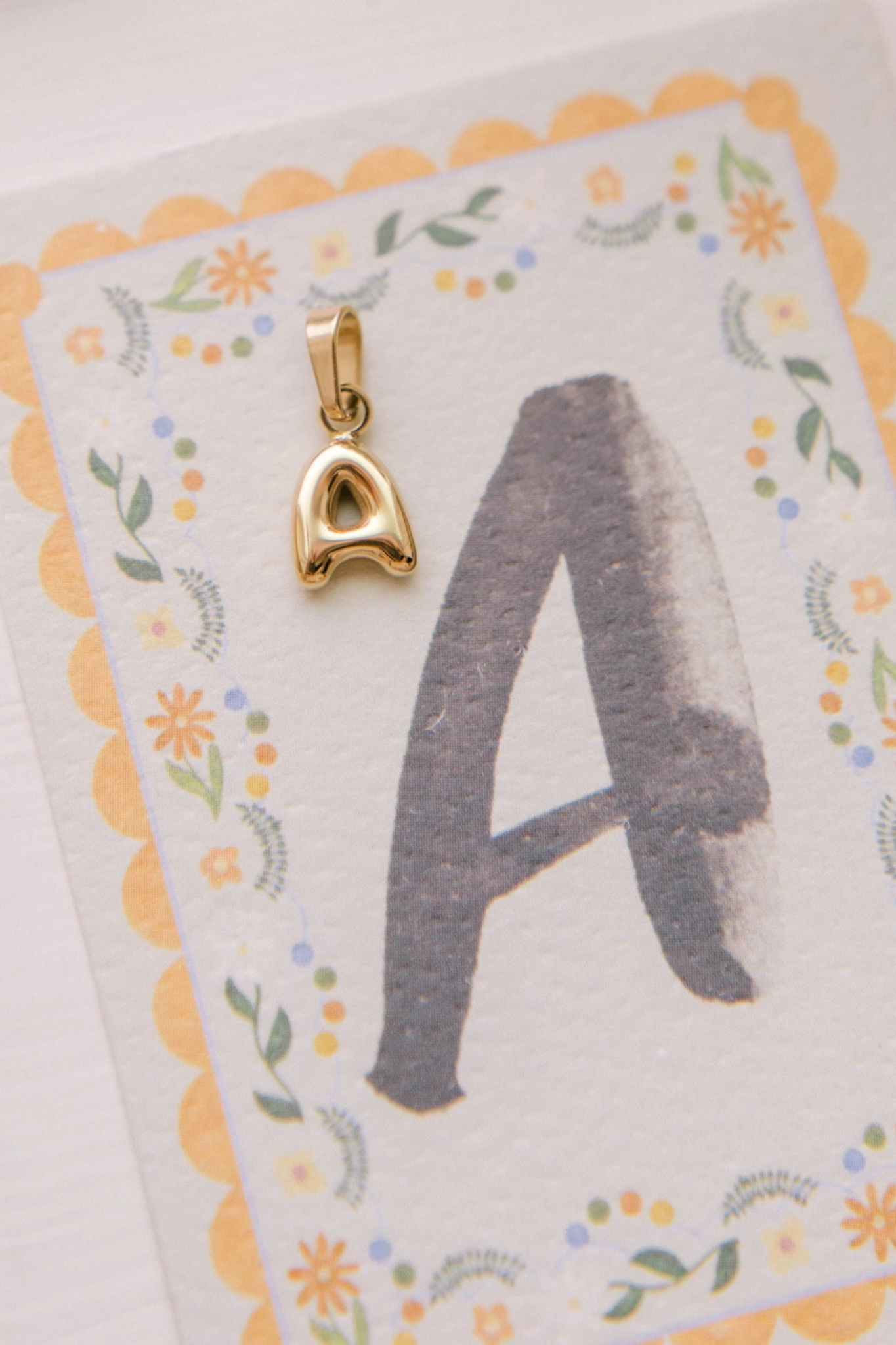 A - Letter Charm