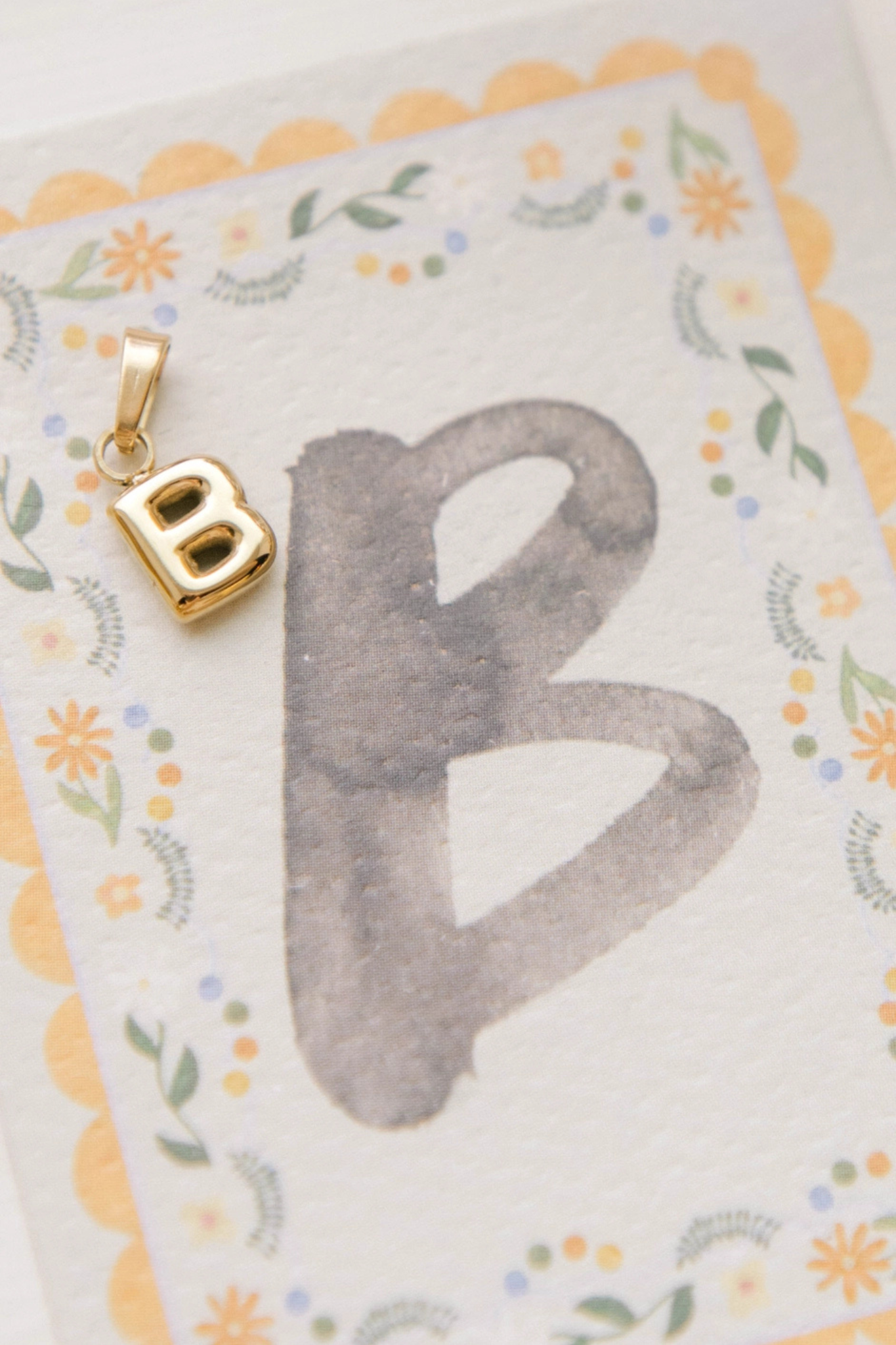 B - Letter Charm