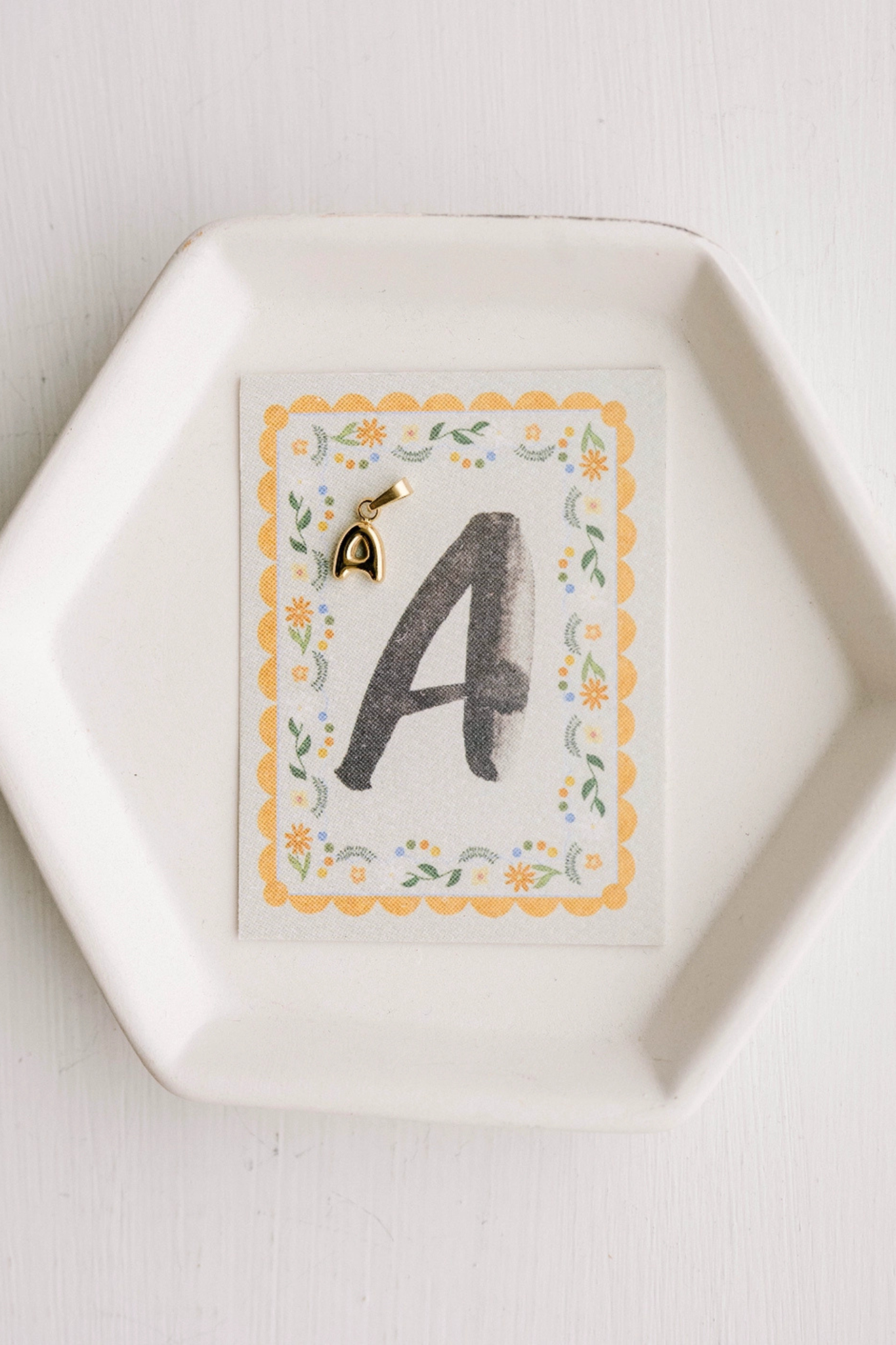 A - Letter Charm
